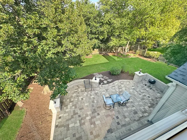a bathroom with a toilet a sink and a mirror
