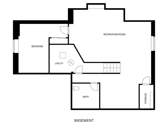 an aerial view of a house with outdoor space
