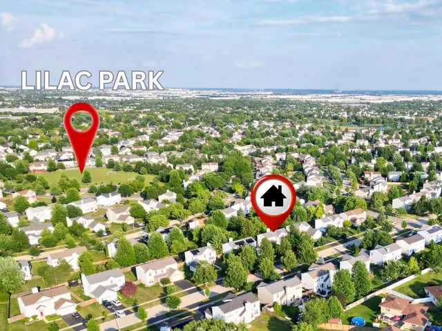 a view of a park that has a sign board