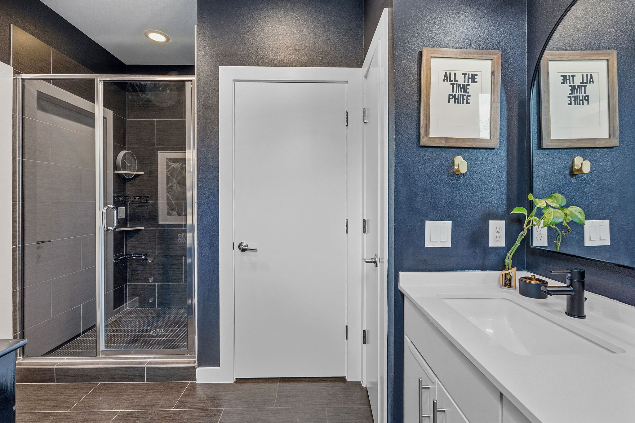 3001 Del Curto Road, Unit 31 Austin, TX 78704 - Photo 20 of 32 a bathroom with a shower sink and mirror