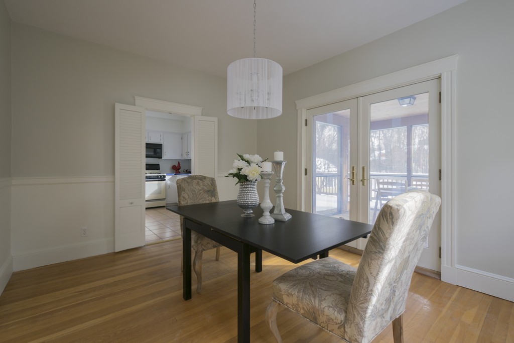 18 Middle Street Lexington, MA 02421 - Photo 8 of 30 a view of a dining room with furniture and wooden floor