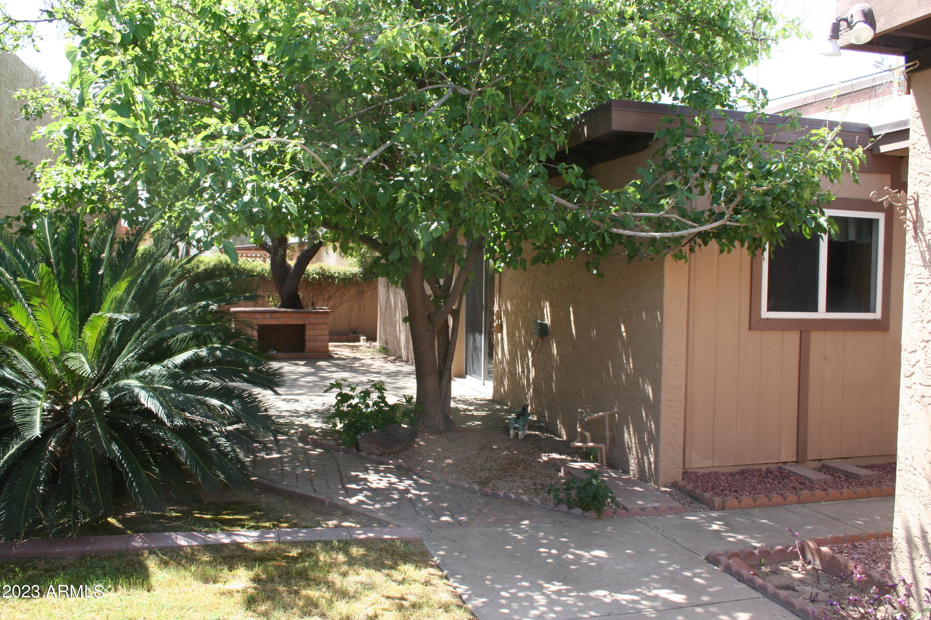 2914 South Price Road Tempe, AZ 85282 - Photo 6 of 30 a view of a house with a yard