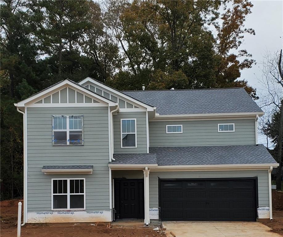 2739 Eagles Crest Lane Decatur, GA 30034 - Photo 1 of 1 a front view of a house with a garage