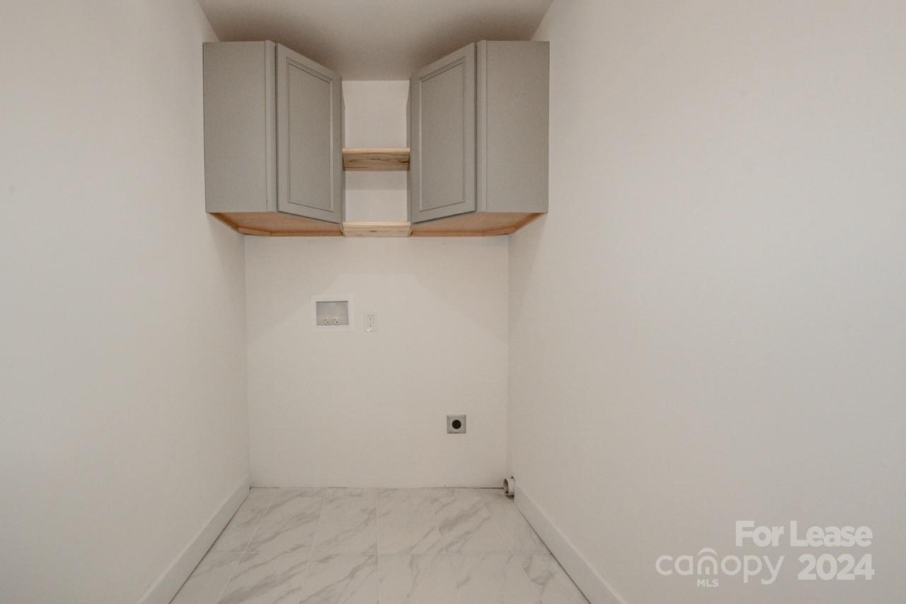 4892 Highway 16 Denver, NC 28037 - Photo 19 of 46 a view of cabinets and wooden floor