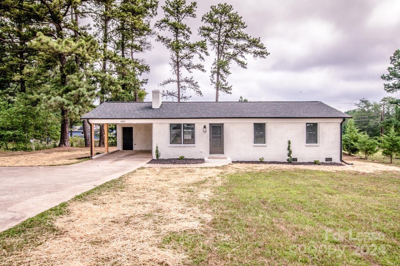4892 Highway 16 Denver, NC 28037 - Photo 2 of 46 front view of a house with a patio