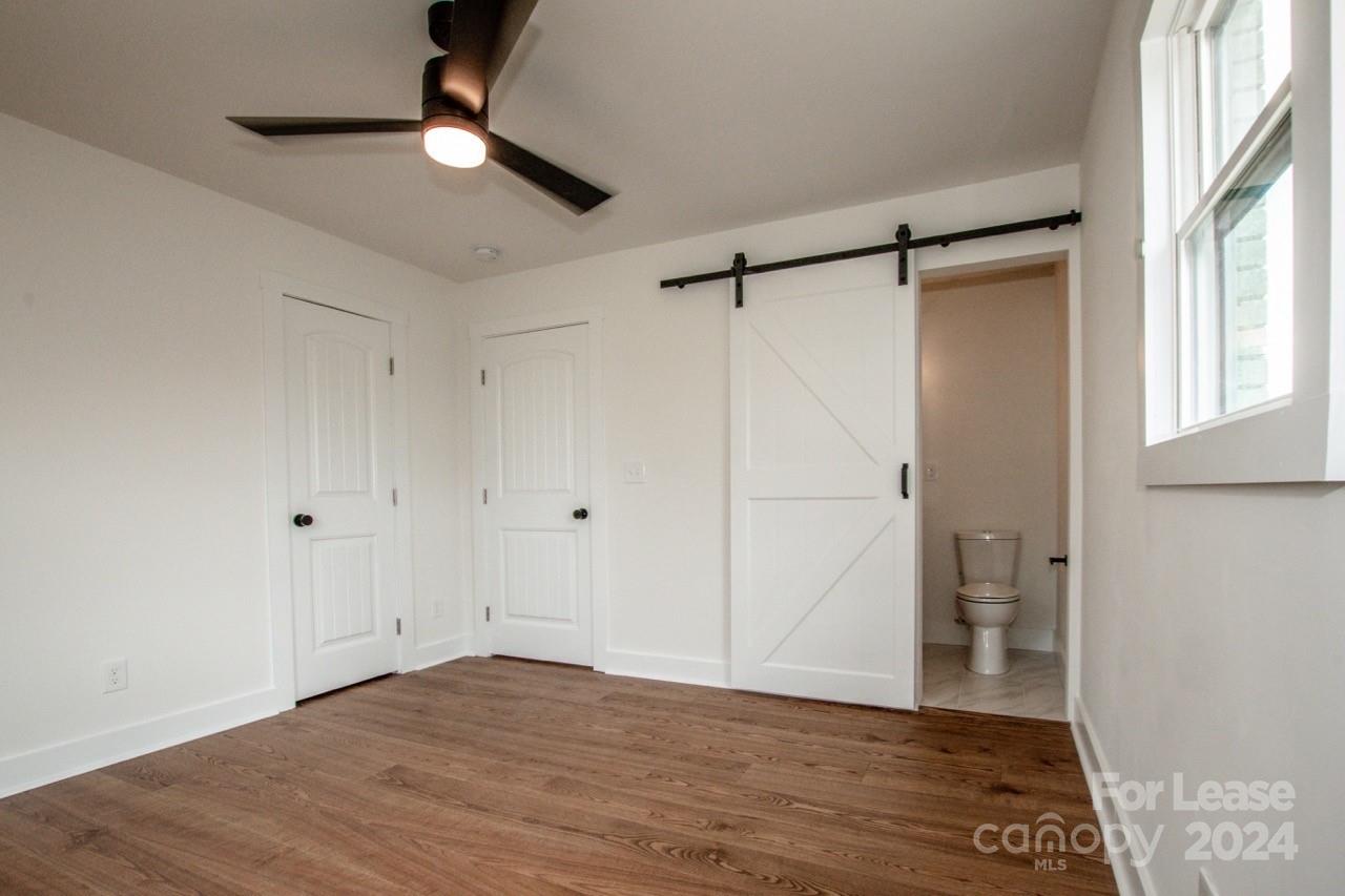 4892 Highway 16 Denver, NC 28037 - Photo 26 of 46 a view of an empty room with a window