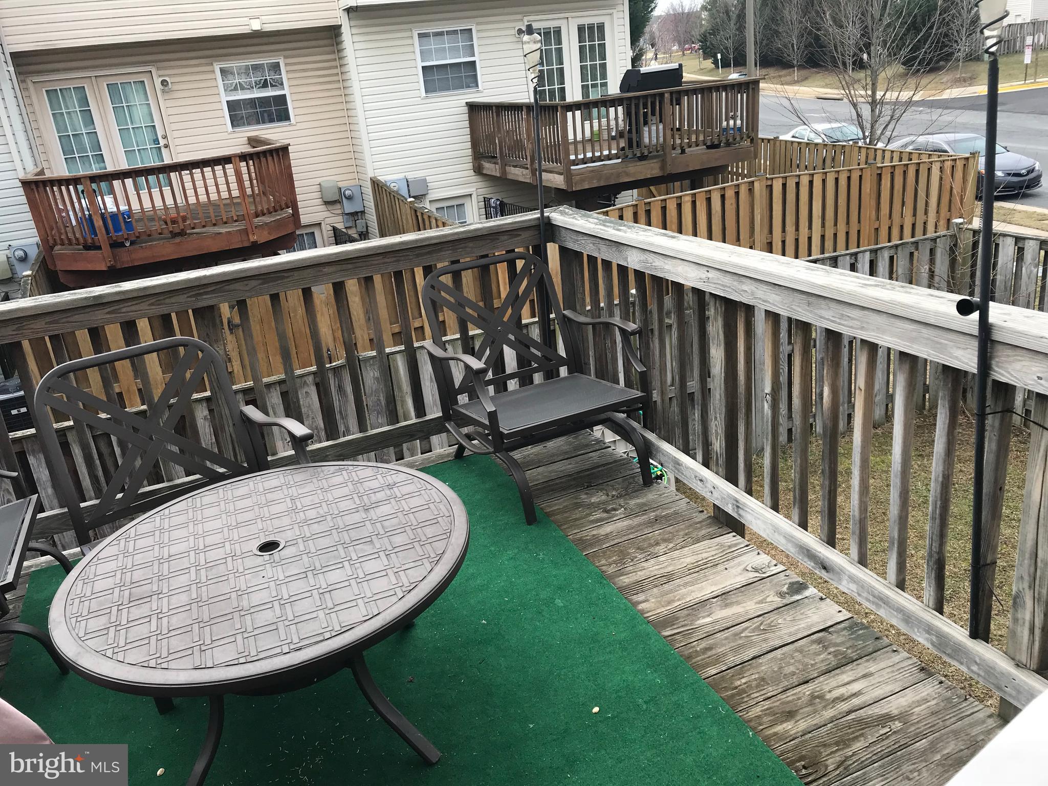 6389 Trips Way Springfield, VA 22150 - Photo 20 of 22 a view of balcony with wooden floor