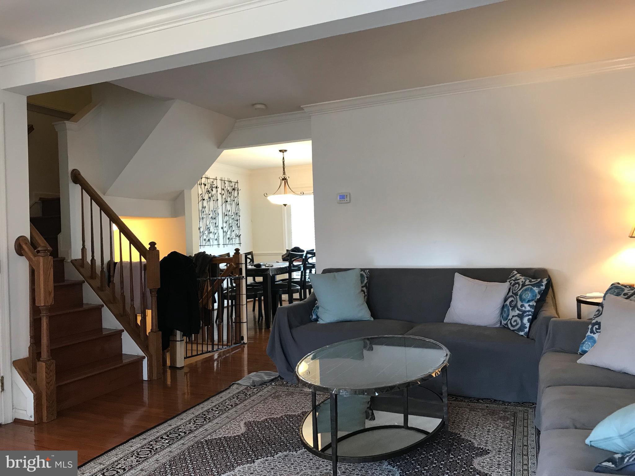 6389 Trips Way Springfield, VA 22150 - Photo 6 of 22 a living room with furniture and wooden floor