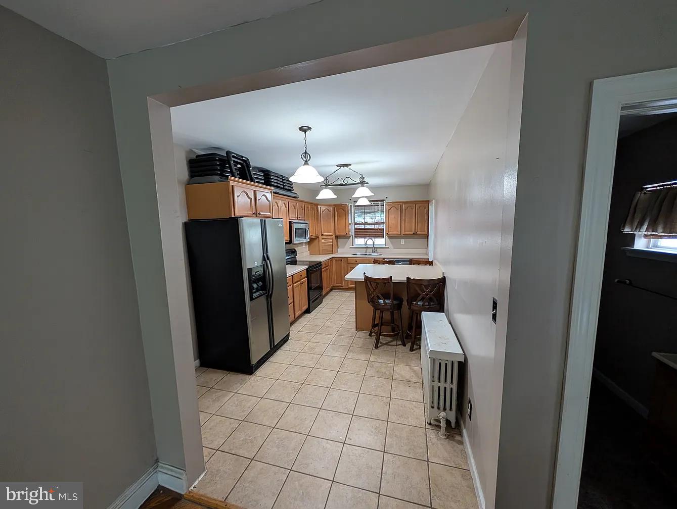 1226 Haycreek Road Birdsboro, PA 19508 - Photo 3 of 16 a view of a kitchen and dining room