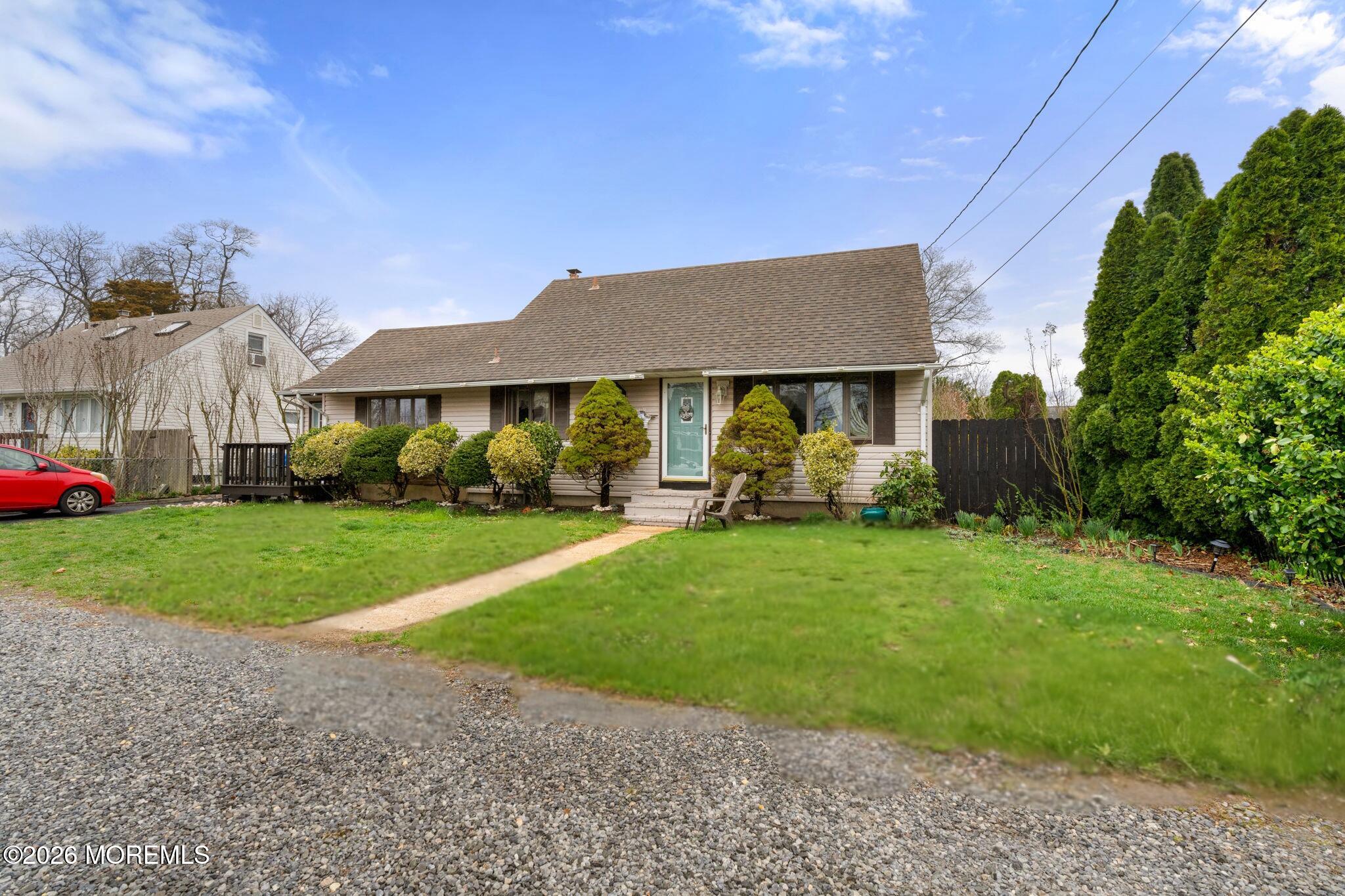 109 Harding Drive Brick, NJ 08724 - Photo 2 of 34 a front view of a house with garden