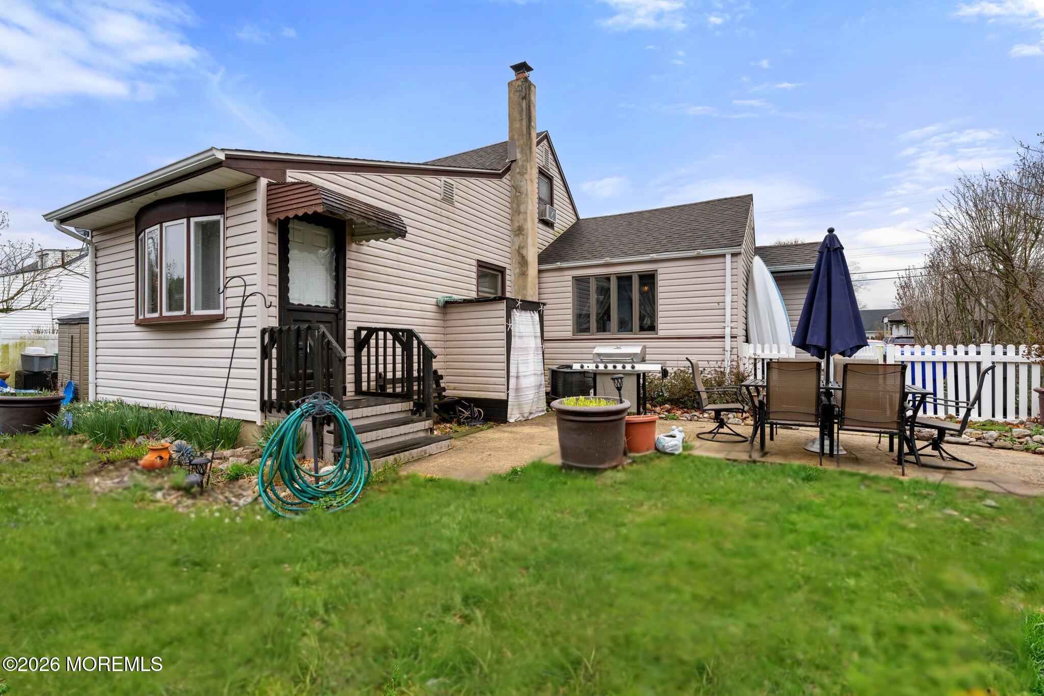 109 Harding Drive Brick, NJ 08724 - Photo 28 of 34 a front view of a house with patio