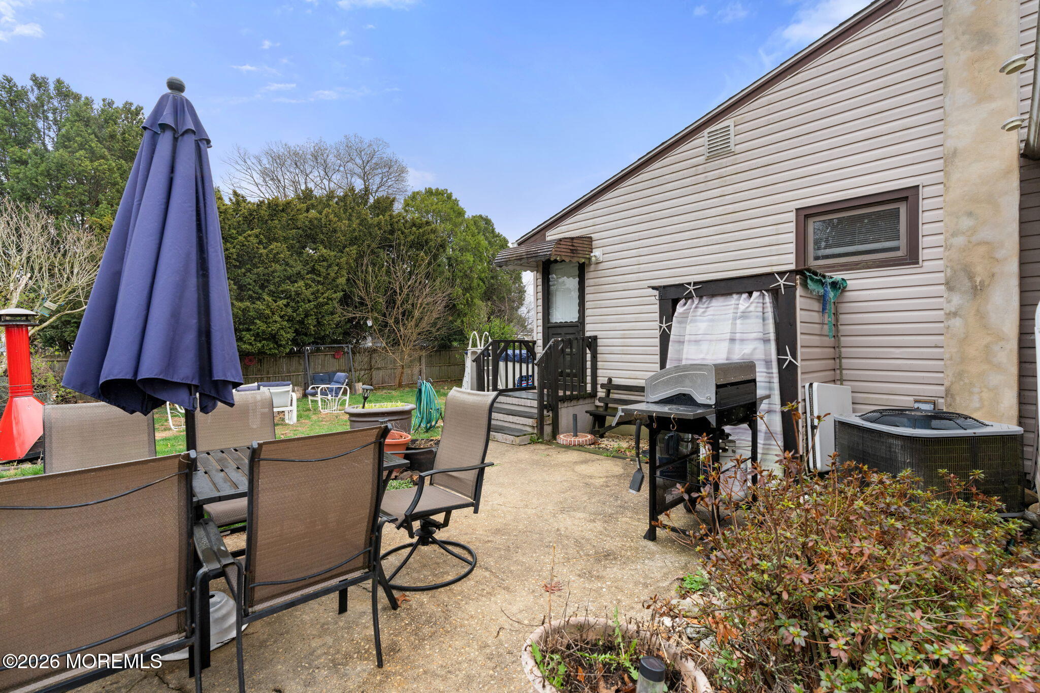 109 Harding Drive Brick, NJ 08724 - Photo 29 of 34 a view of a chairs and table in patio
