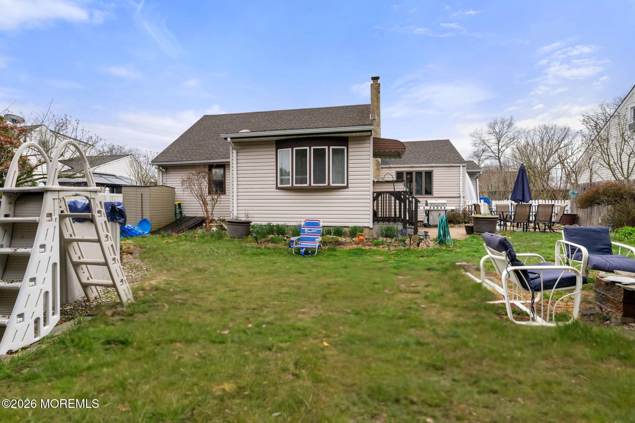 109 Harding Drive Brick, NJ 08724 - Photo 31 of 34 a house view with a garden space