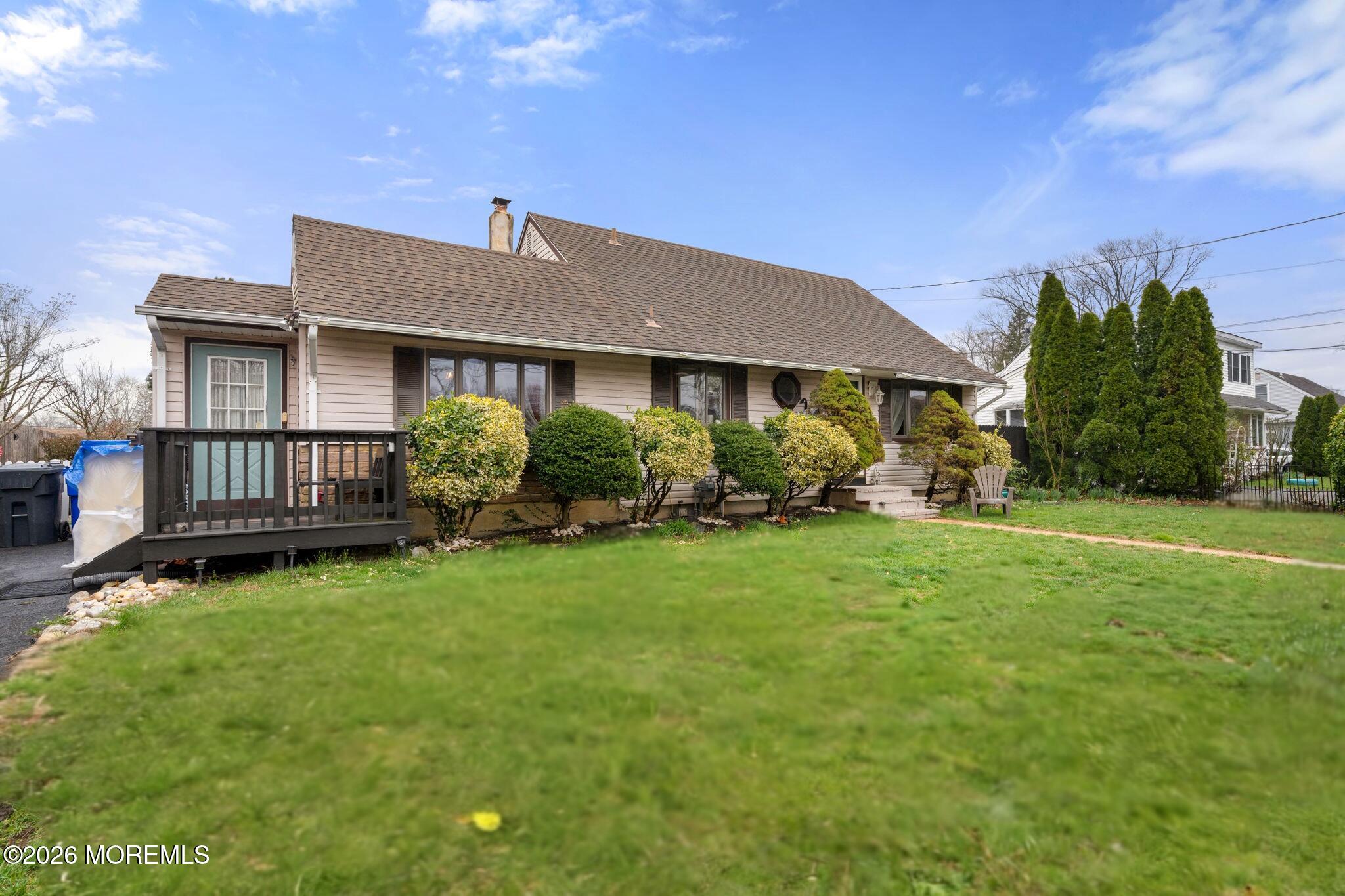 109 Harding Drive Brick, NJ 08724 - Photo 5 of 34 a front view of a house with garden