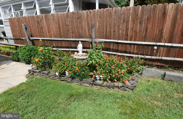 a view of a wooden fence