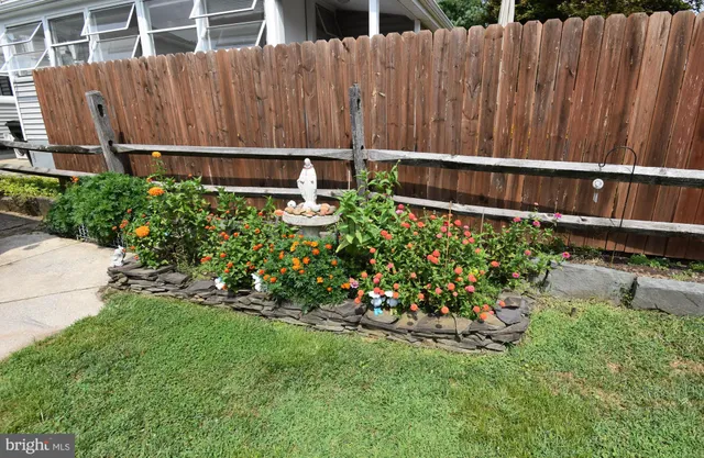 a view of a wooden fence