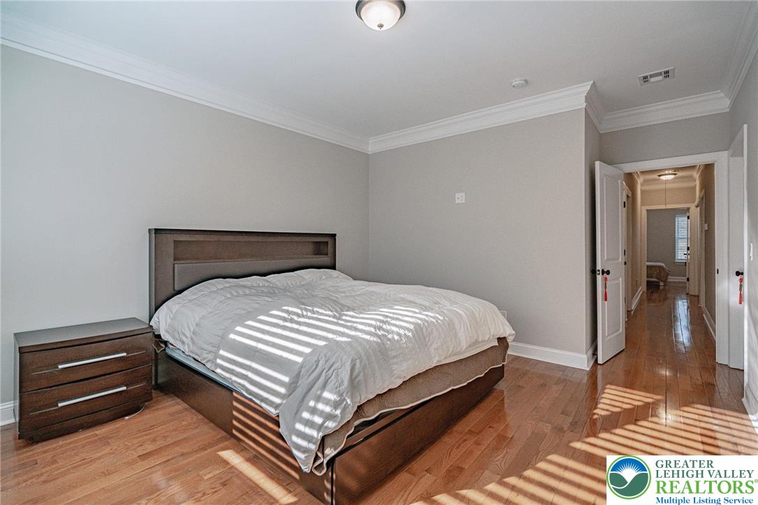 1490 East 7th Street Bethlehem, PA 18015 - Photo 12 of 22 a bedroom with a bed and a window