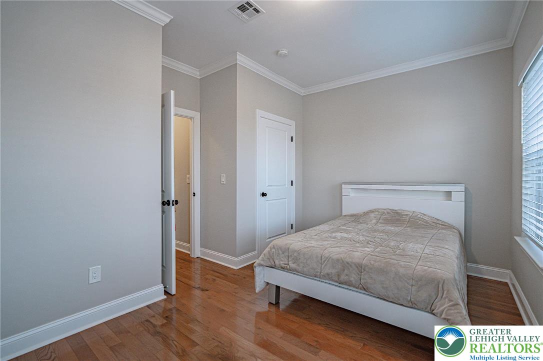 1490 East 7th Street Bethlehem, PA 18015 - Photo 16 of 22 a bedroom with a bed and a window