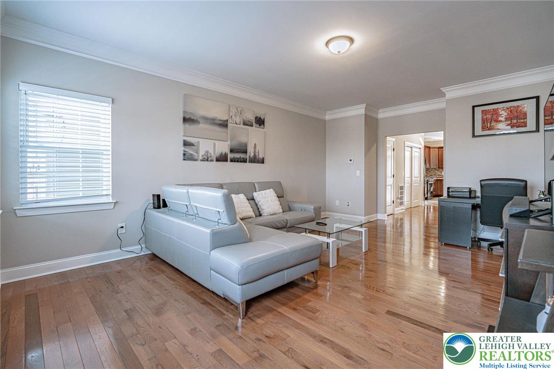 1490 East 7th Street Bethlehem, PA 18015 - Photo 7 of 22 a living room with furniture and a wooden floor