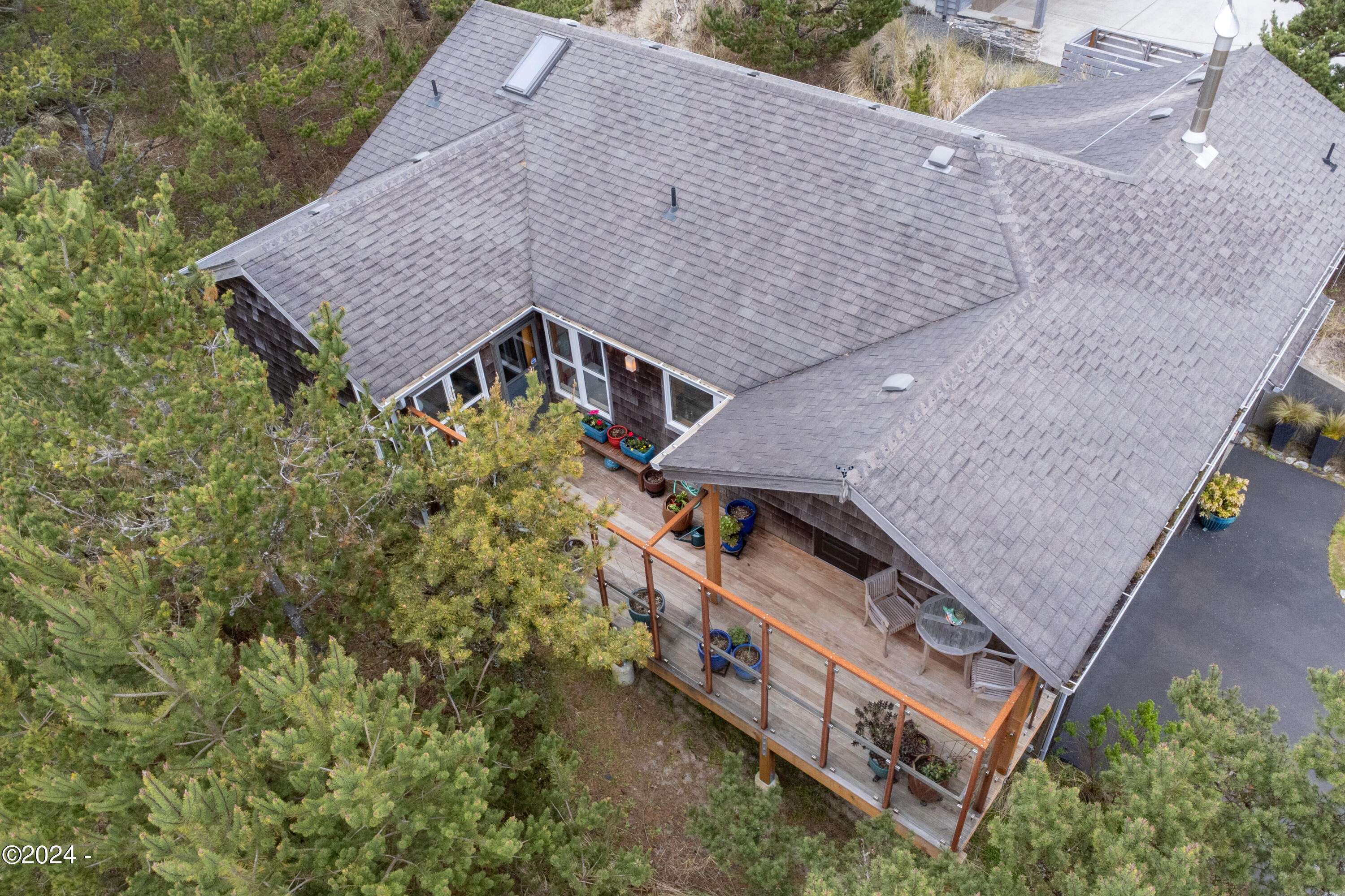 6855 Nestucca Ridge Road Pacific City, OR 97135 - Photo 34 of 44 an aerial view of a house with a yard and large trees