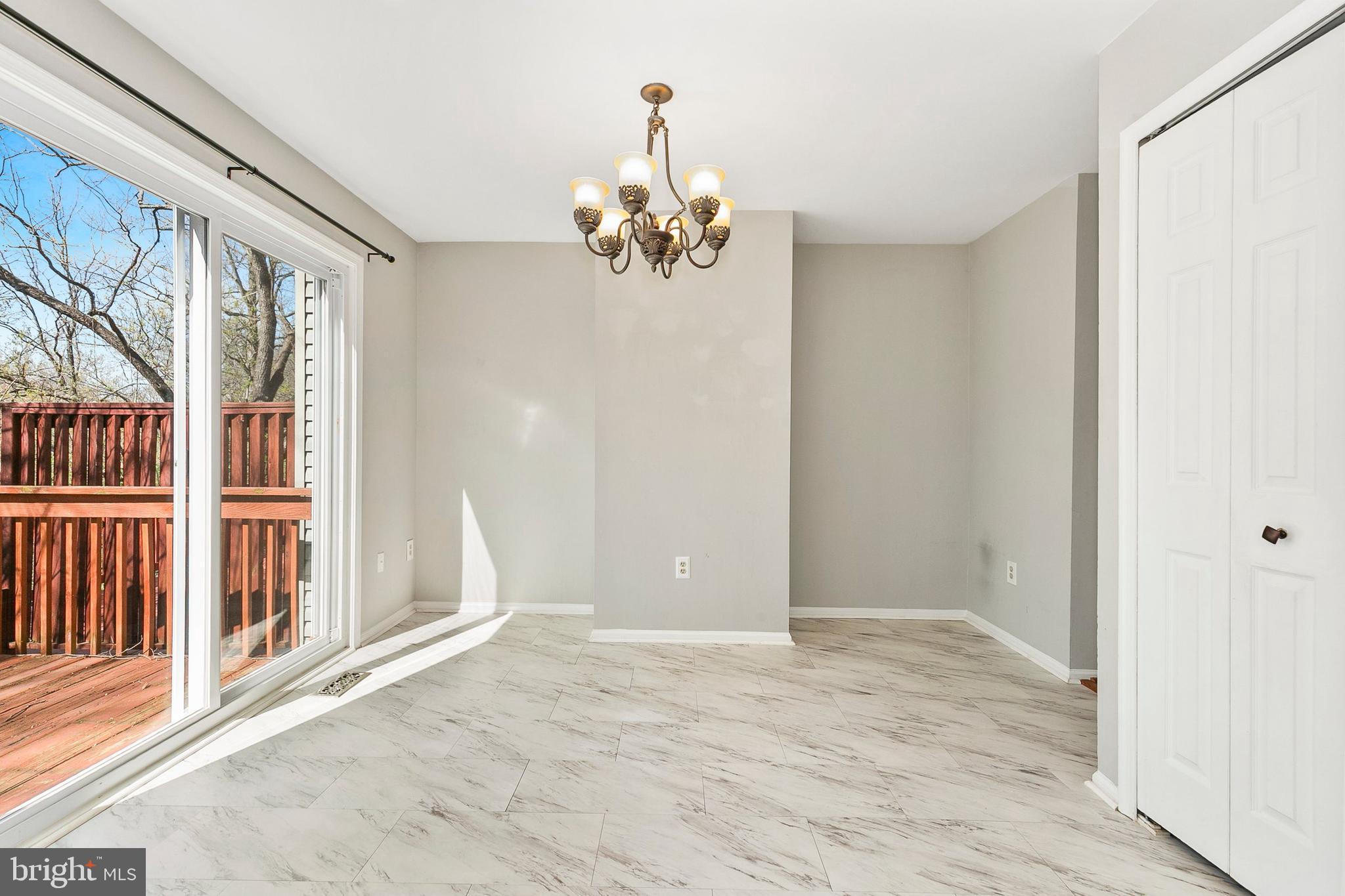 4762 Leyden Way Ellicott City, MD 21042 - Photo 22 of 58 a view of an empty room with a window