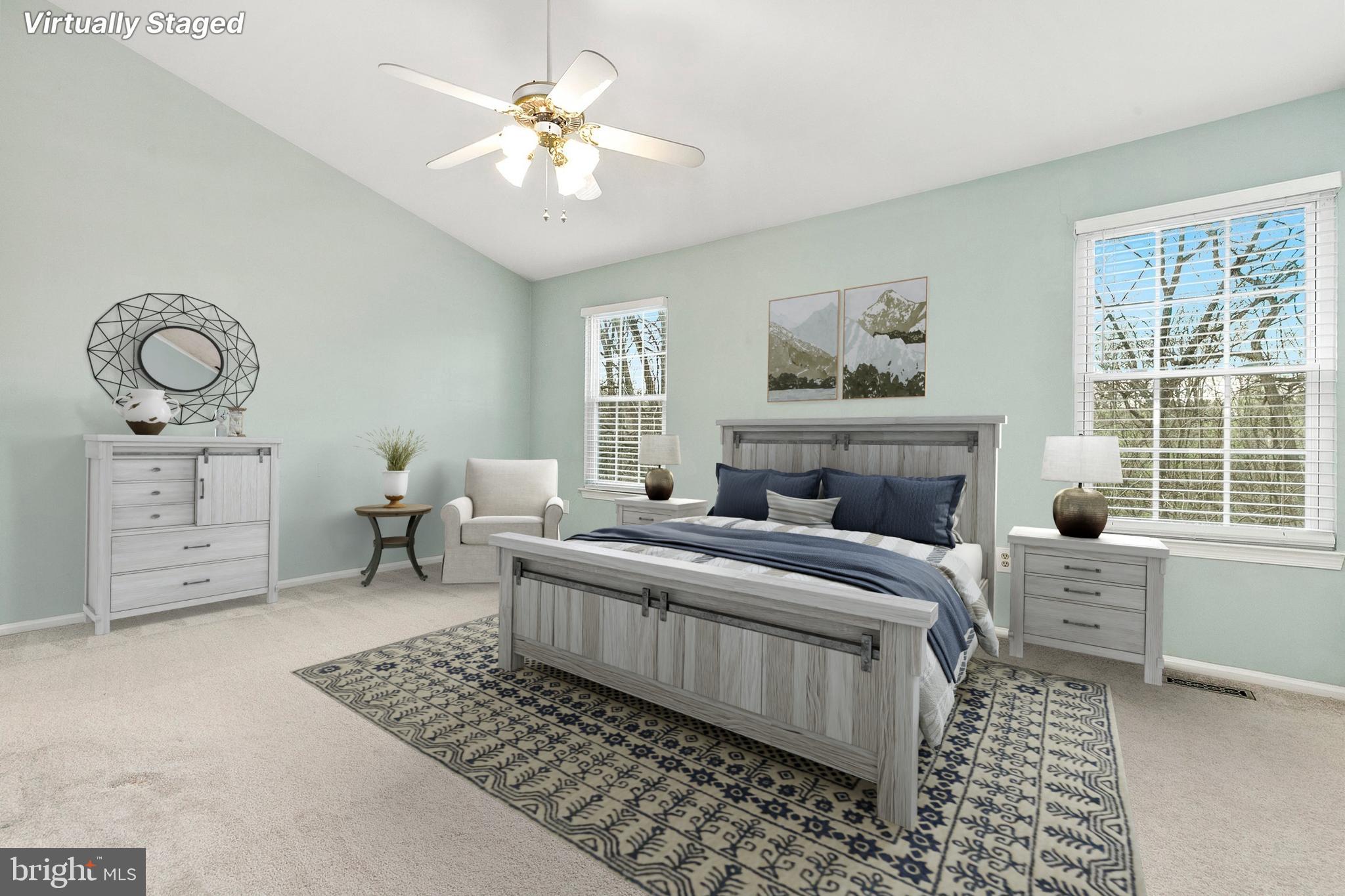 4762 Leyden Way Ellicott City, MD 21042 - Photo 25 of 58 a living room with furniture a fireplace and a window