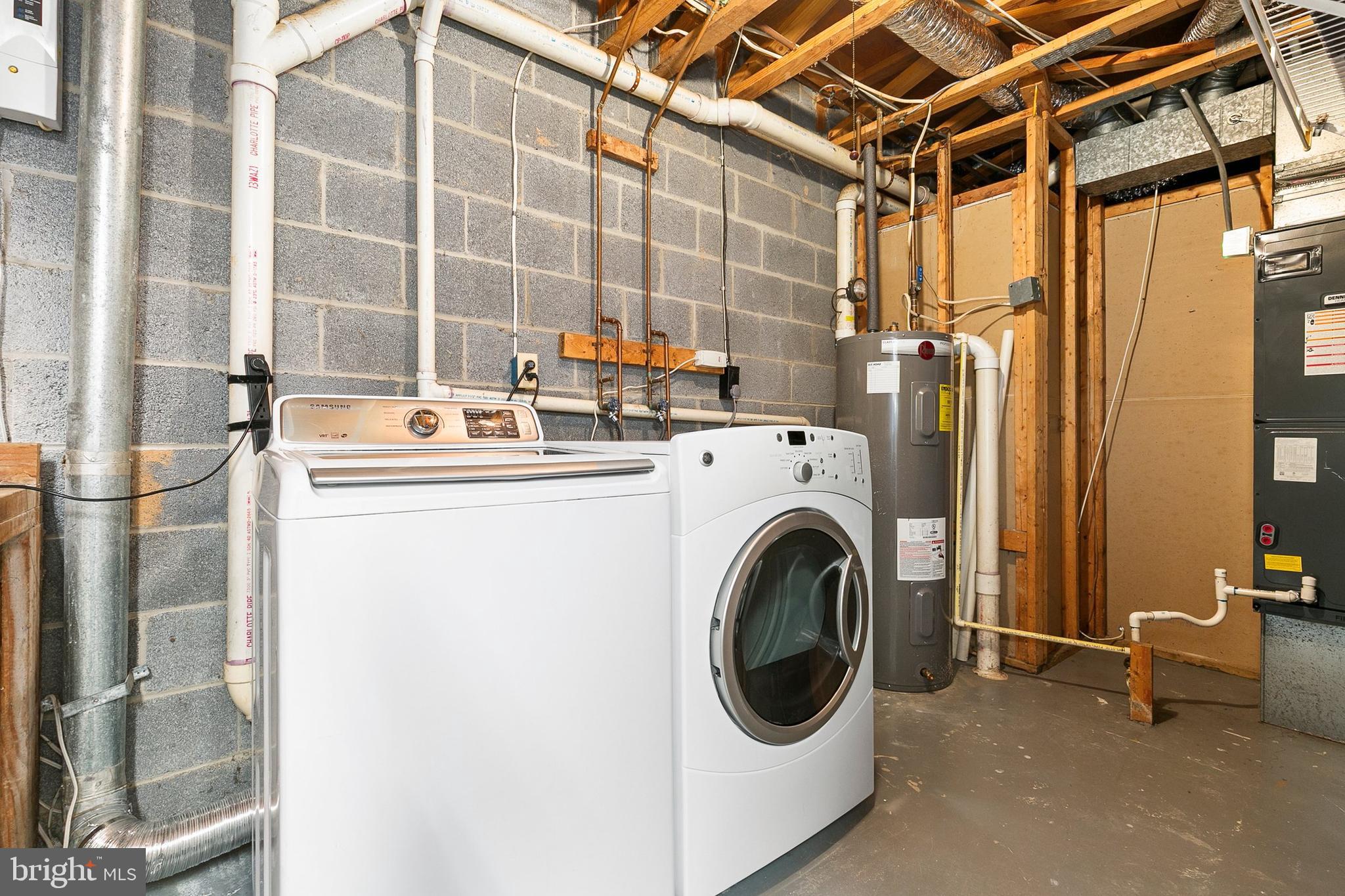 4762 Leyden Way Ellicott City, MD 21042 - Photo 48 of 58 a utility room with dryer and washer