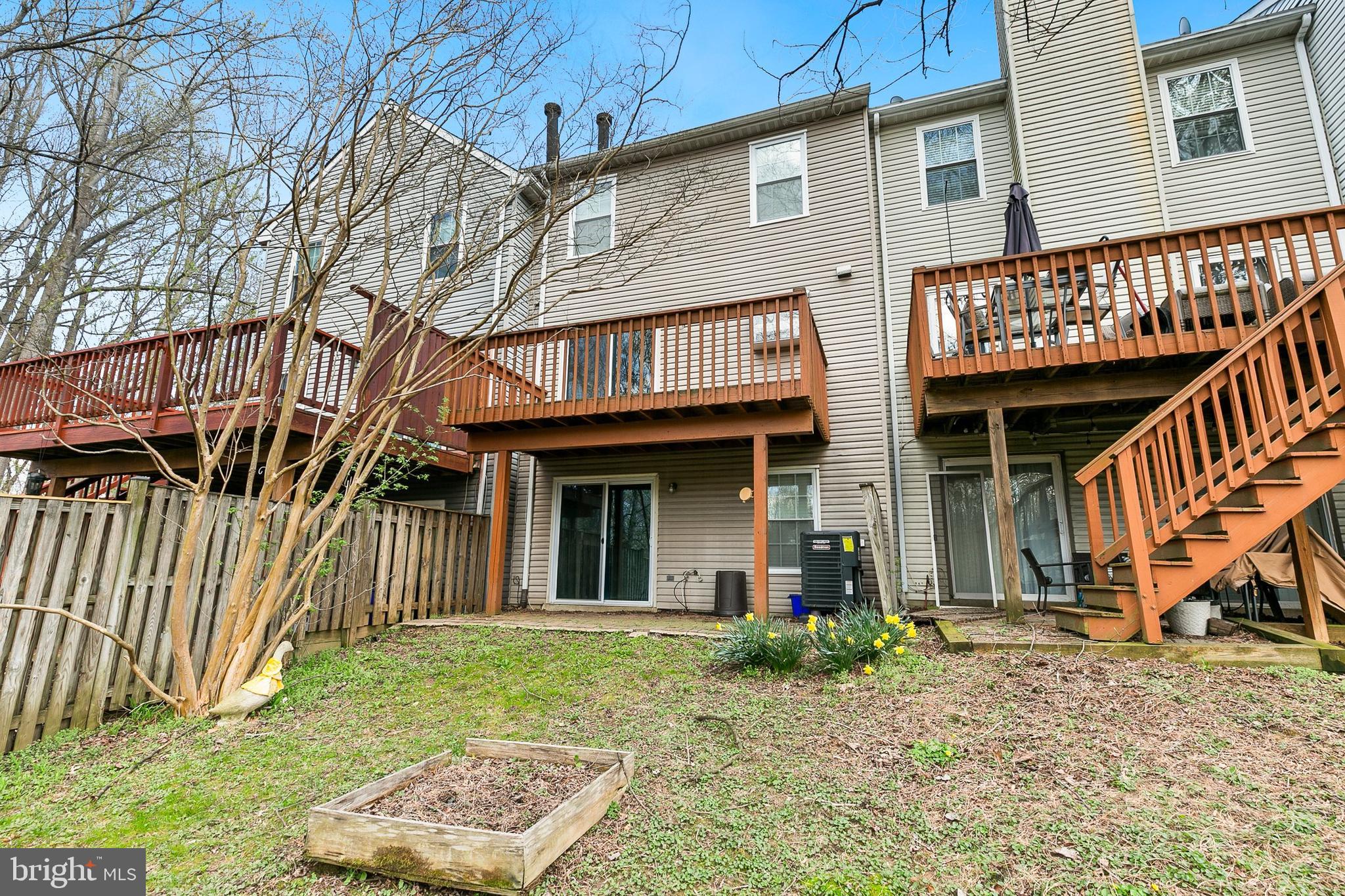 4762 Leyden Way Ellicott City, MD 21042 - Photo 52 of 58 a view of a brick house with many windows
