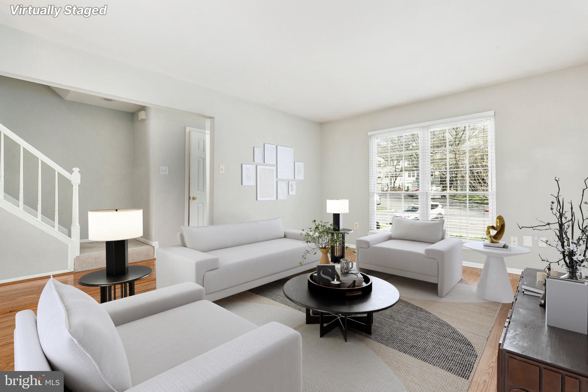 4762 Leyden Way Ellicott City, MD 21042 - Photo 6 of 58 a living room with furniture and a large window