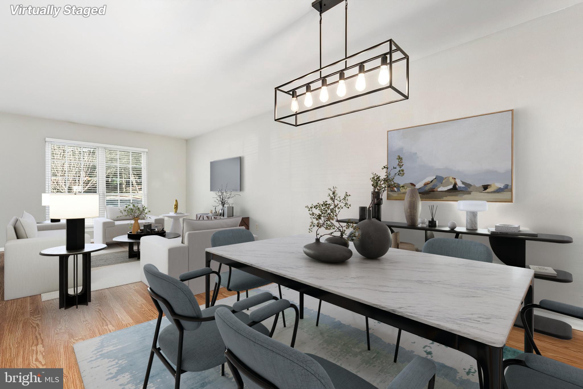 4762 Leyden Way Ellicott City, MD 21042 - Photo 9 of 58 a view of a dining room with furniture window and wooden floor