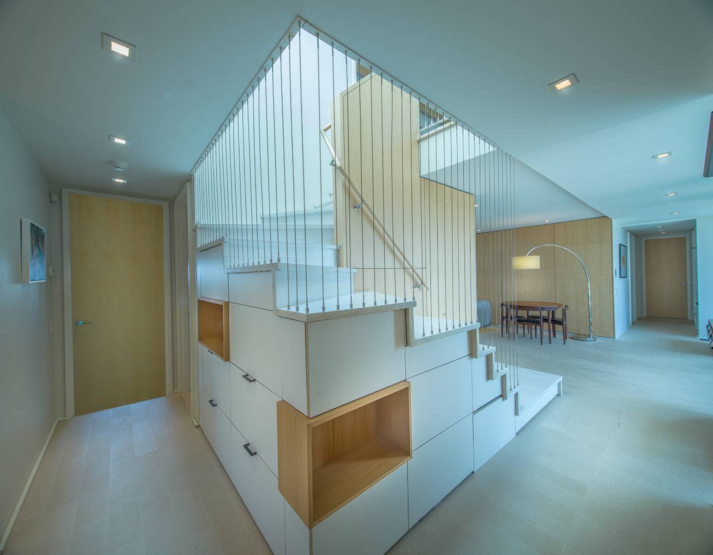 615 Dune Road Westhampton, NY 11978 - Photo 12 of 29 a view of entryway bedroom and hall with wooden floor