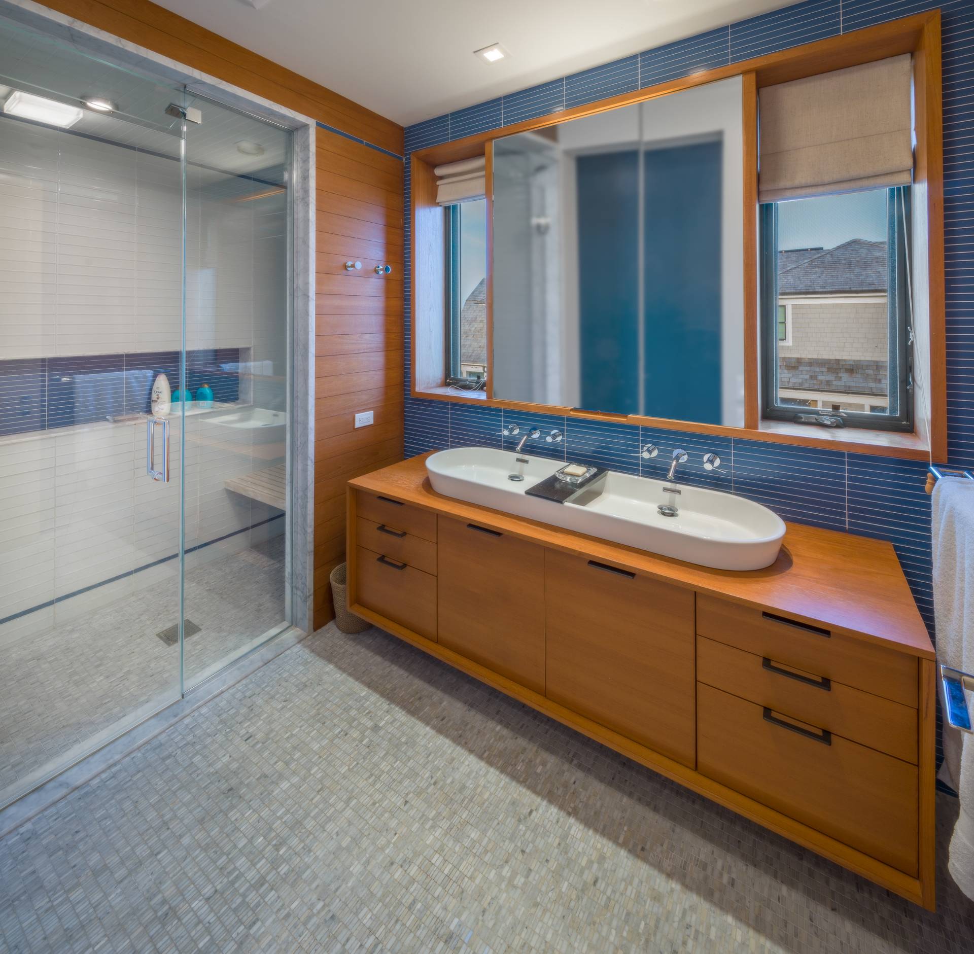 615 Dune Road Westhampton, NY 11978 - Photo 14 of 29 a bathroom with a sink and a mirror