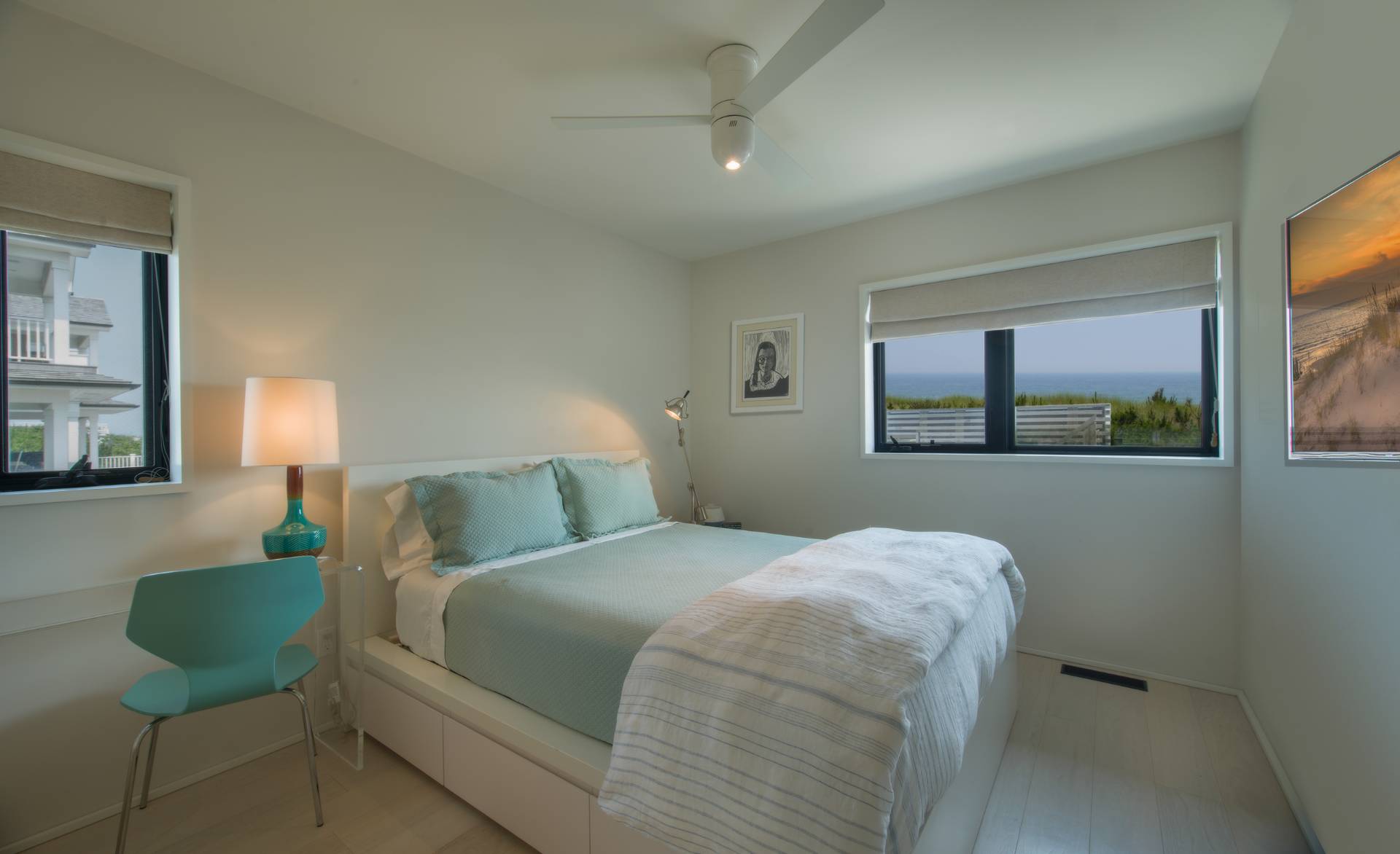 615 Dune Road Westhampton, NY 11978 - Photo 16 of 29 a bedroom with a bed and window