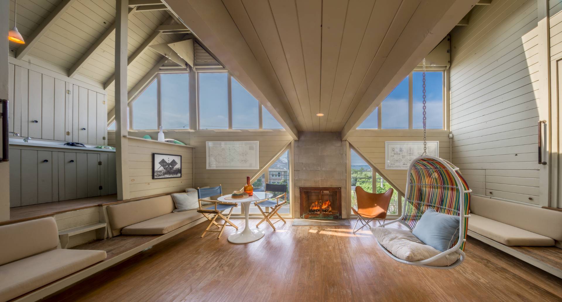 615 Dune Road Westhampton, NY 11978 - Photo 23 of 29 a living room with furniture and a fireplace
