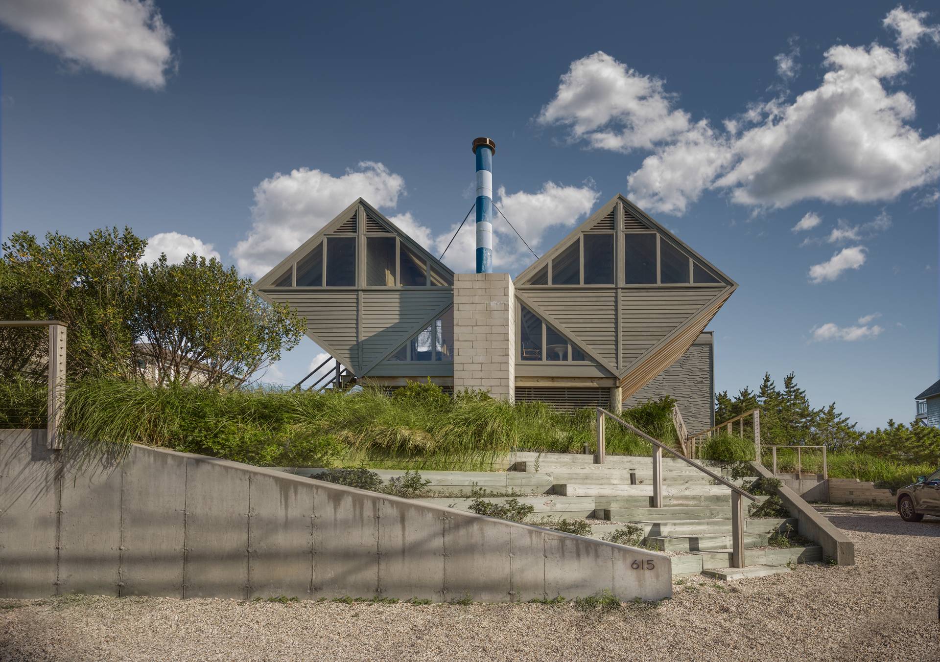 615 Dune Road Westhampton, NY 11978 - Photo 29 of 29 a front view of a house with a yard