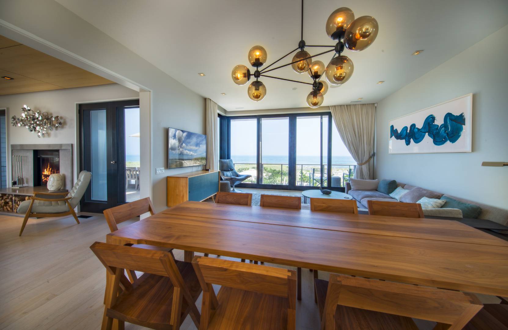 615 Dune Road Westhampton, NY 11978 - Photo 6 of 29 a view of a dining room with furniture window and wooden floor