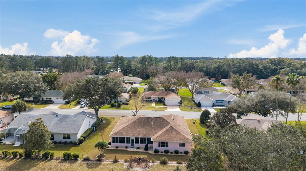 9910 Southeast 138th Loop Summerfield, FL 34491 - Photo 45 of 69 a view of a town with swimming pool and mountains