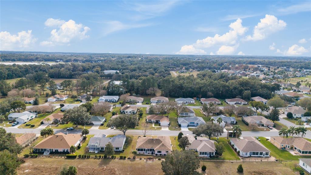 9910 Southeast 138th Loop Summerfield, FL 34491 - Photo 52 of 69 an aerial view of a city