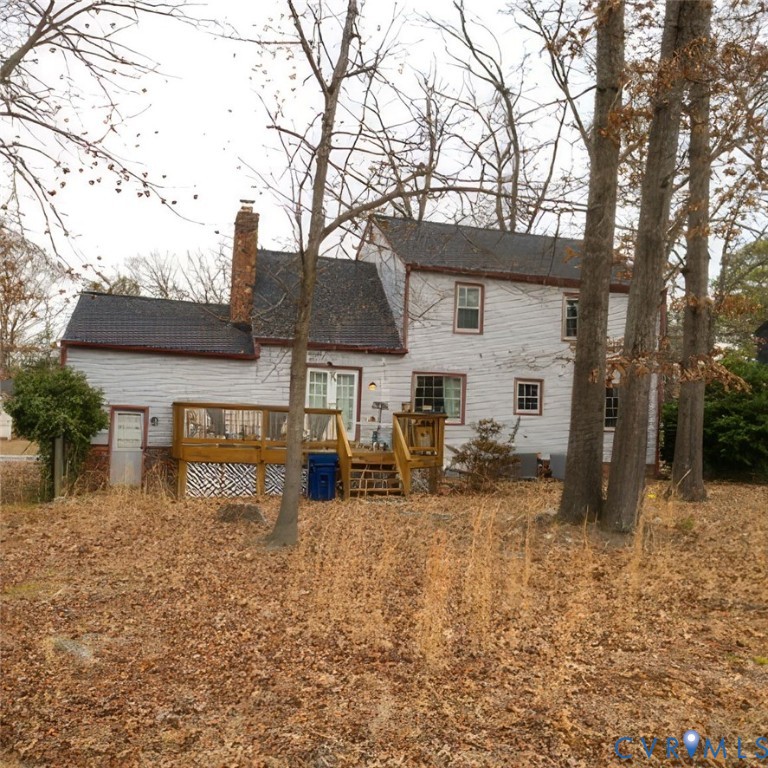 9525 Alfaree Road Richmond, VA 23237 - Photo 18 of 20 Rear view of property featuring a chimney, a deck,