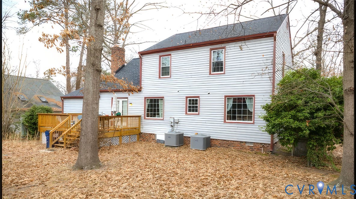 9525 Alfaree Road Richmond, VA 23237 - Photo 19 of 20 Rear view of property with a shingled roof, a deck