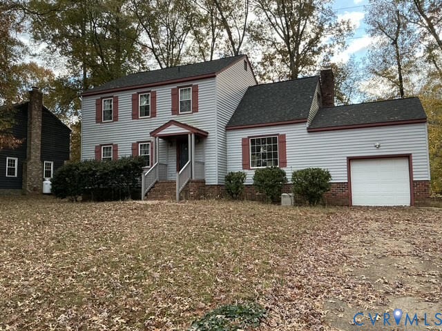 9525 Alfaree Road Richmond, VA 23237 - Photo 2 of 20 View of front of home with a chimney, an attached