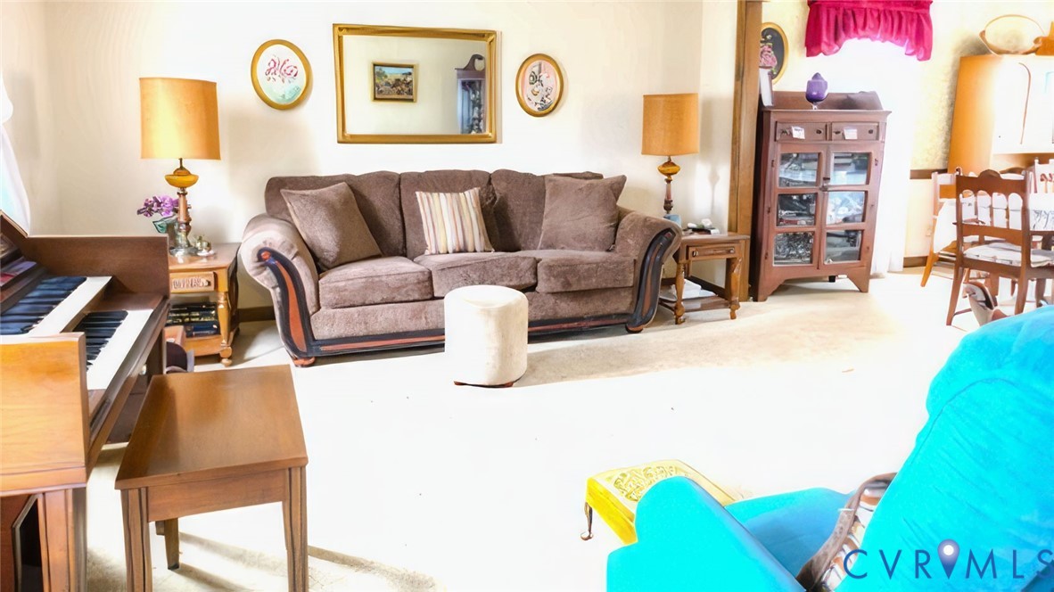 9525 Alfaree Road Richmond, VA 23237 - Photo 4 of 20 Living area featuring carpet floors