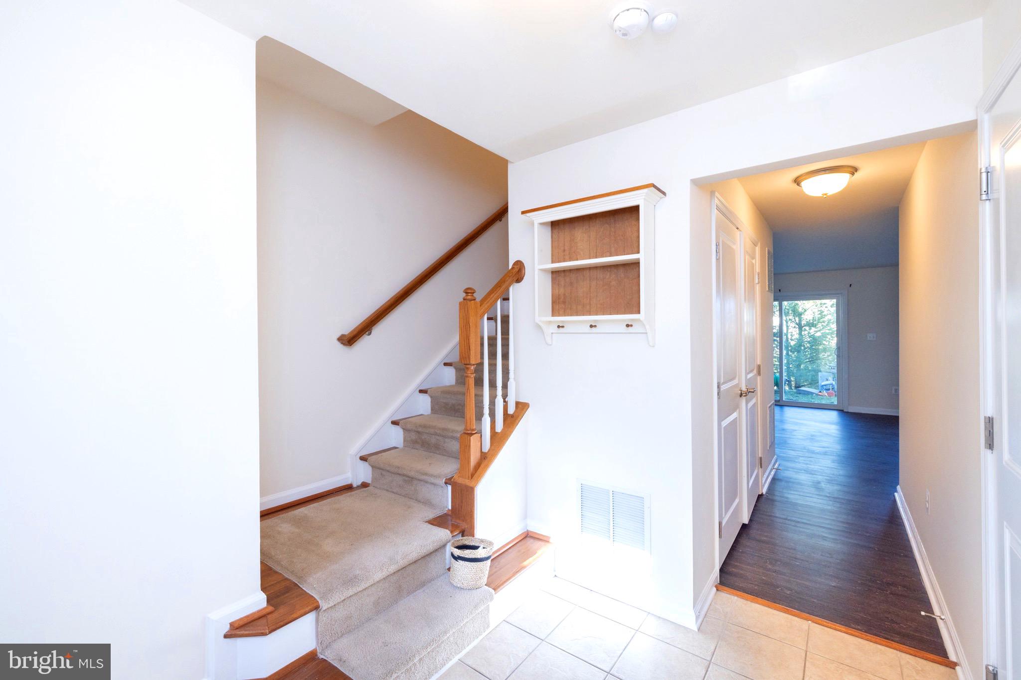 202 Fiesta Drive Stephenson, VA 22656 - Photo 19 of 33 a view of a hallway with staircase