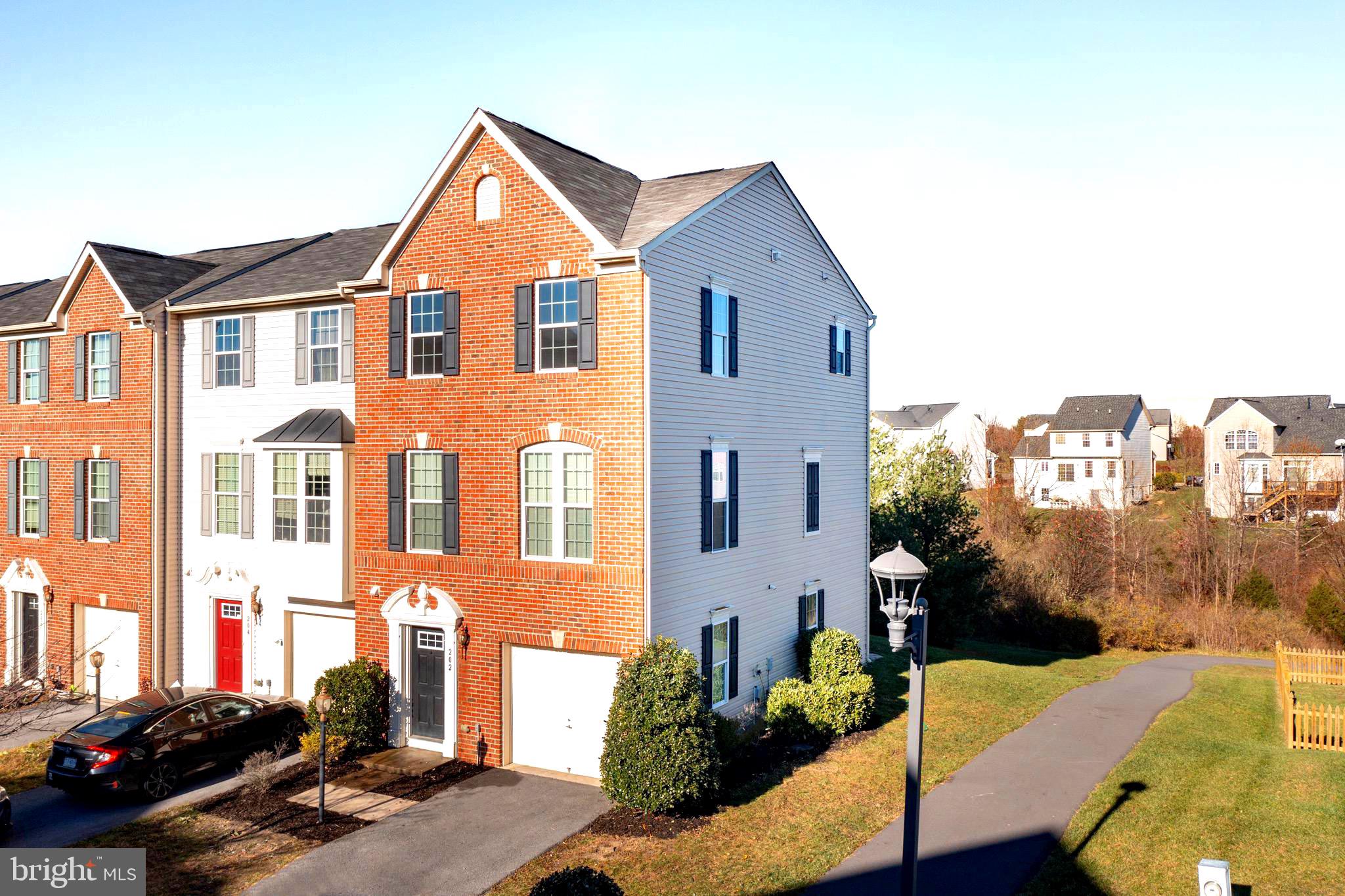 202 Fiesta Drive Stephenson, VA 22656 - Photo 2 of 33 a front view of a house with a yard
