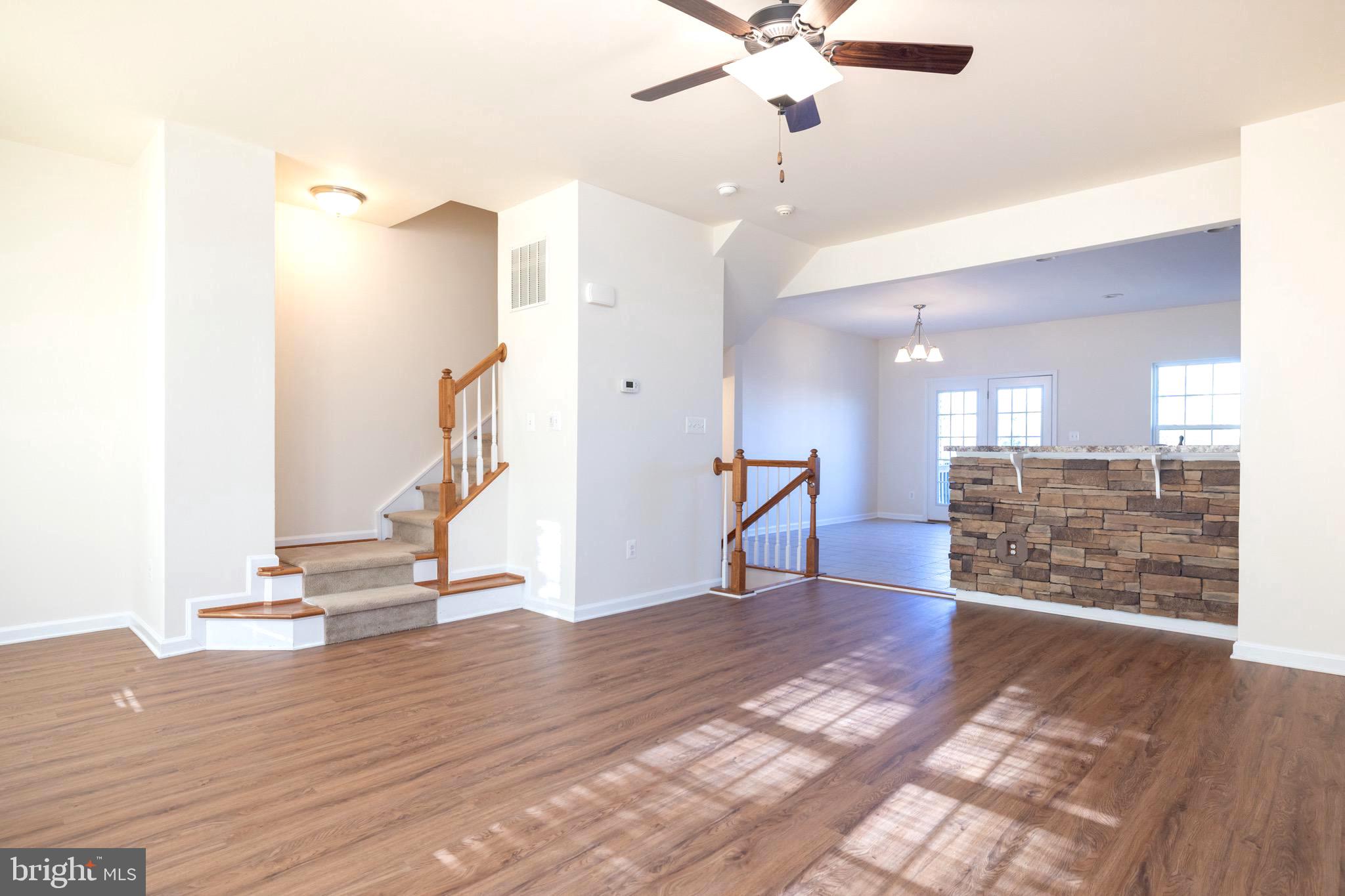 202 Fiesta Drive Stephenson, VA 22656 - Photo 33 of 33 a view of empty room with wooden floor