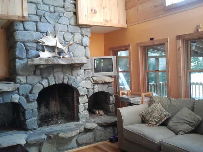54 Grapevine Brook Road Dover-Foxcroft, ME 04426 - Photo 13 of 30 Living Room. Amazing fieldstone...