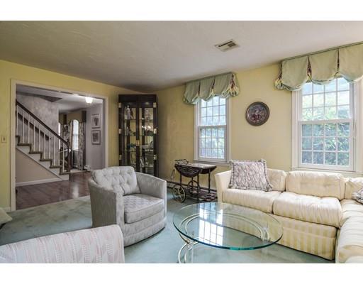 11 Parmenter Road Framingham, MA 01701 - Photo 13 of 24 a living room with furniture and a large window