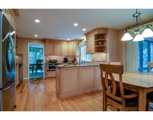 11 Parmenter Road Framingham, MA 01701 - Photo 4 of 24 a kitchen with a table and chairs in it