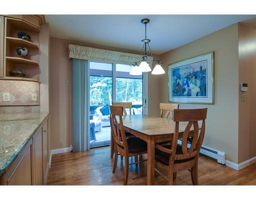 11 Parmenter Road Framingham, MA 01701 - Photo 8 of 24 a view of a dining room with furniture window and wooden floor