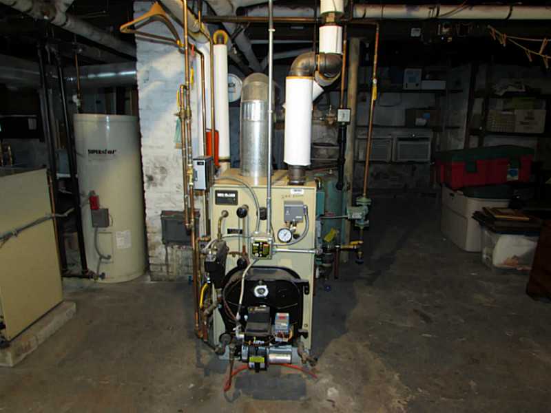100 Meadow Road Woonsocket, RI 02895 - Photo 8 of 9 Exterior Front. 6 Year young Energy efficient Steam Boiler